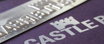 Metallic foil stamping on a purple surface